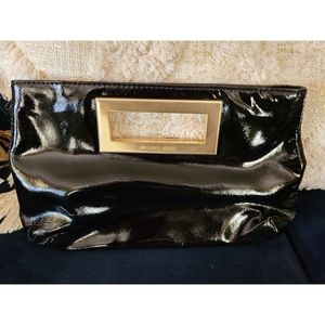 MICHAEL Michael Kors Black Clutch with Gold Accents